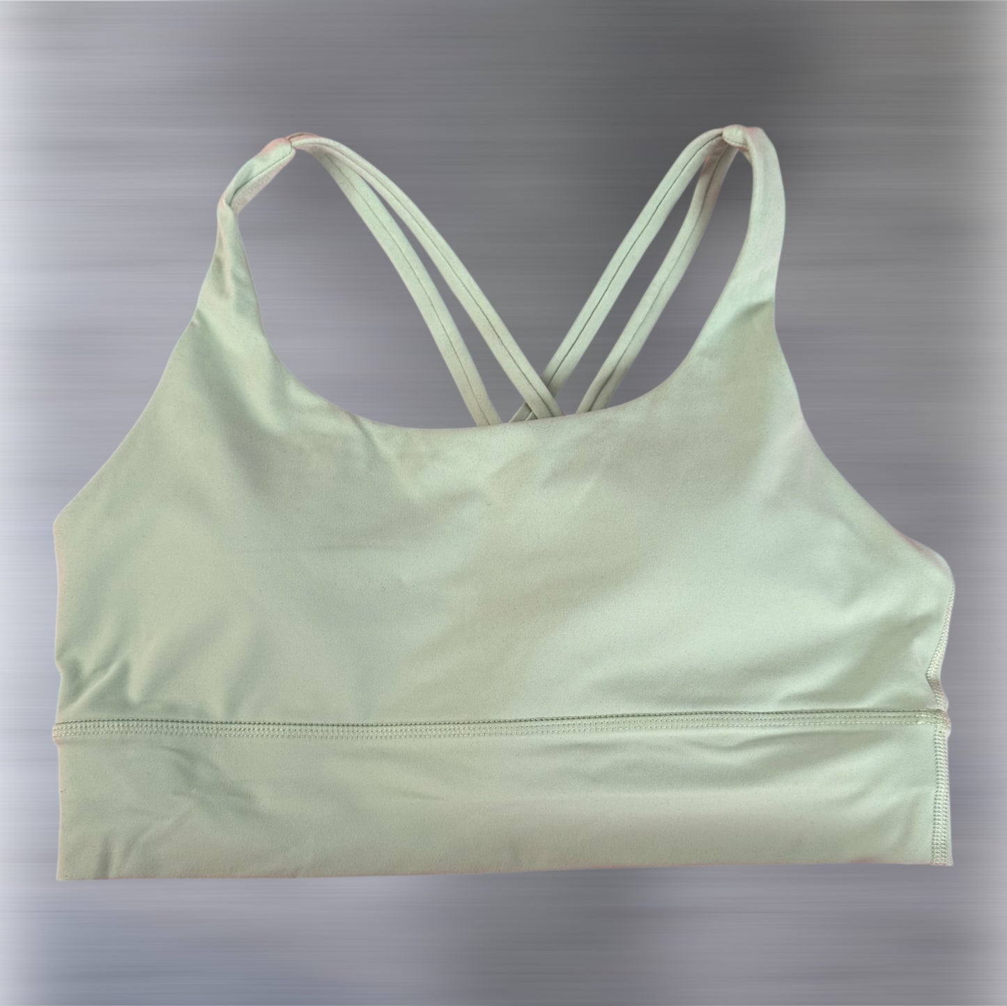 Front view: Light sage green Aphrodite Chill Sports Bra with strappy back design – comfortable, stylish women's activewear from Sportik athletikS