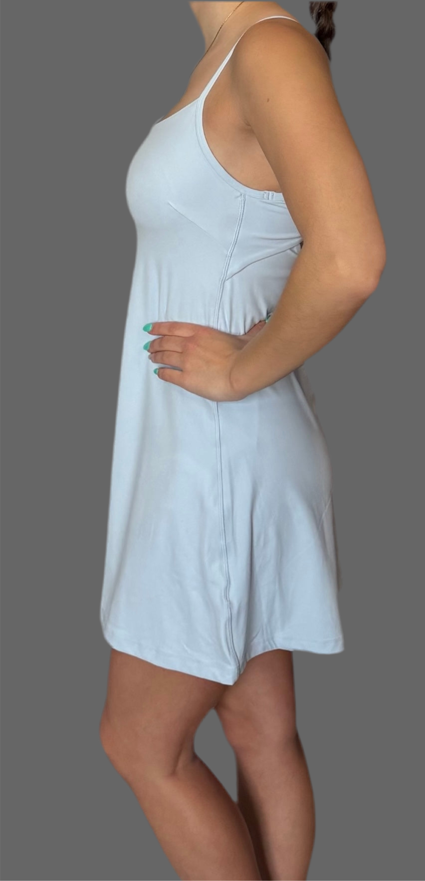Side view of baby blue Athena Active Dress from Sportik athletikS, form-flattering fit with built-in shorts and breathable fabric for active lifestyles